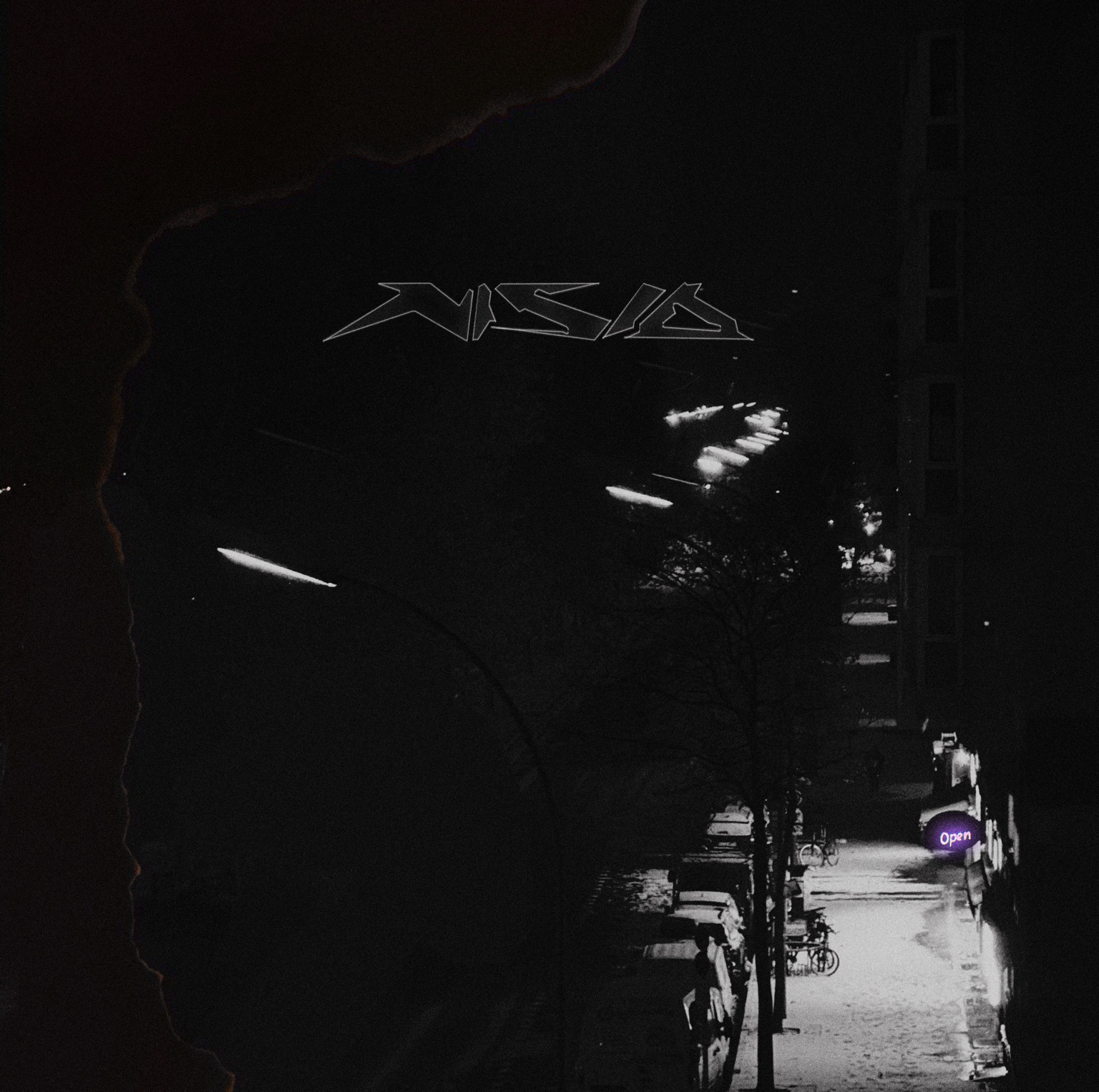 Nisio artwork: black-and-white nighttime street photograph with an angular logo and a small purple detail